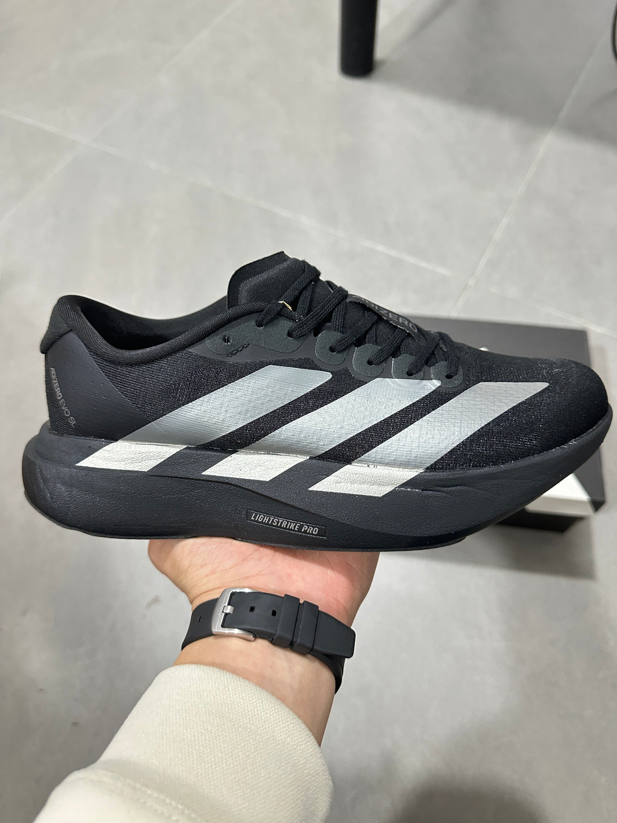 Adidas Lightstrike Pro Running Shoes in Black White JP7147 - product image from the listing.