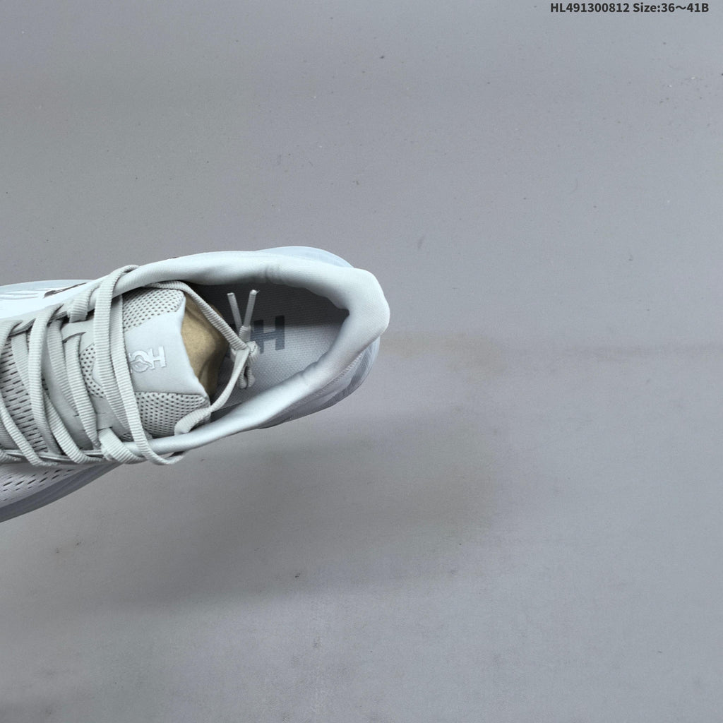 HOKA Clifton 11 Running Shoes in White - product image from the listing.