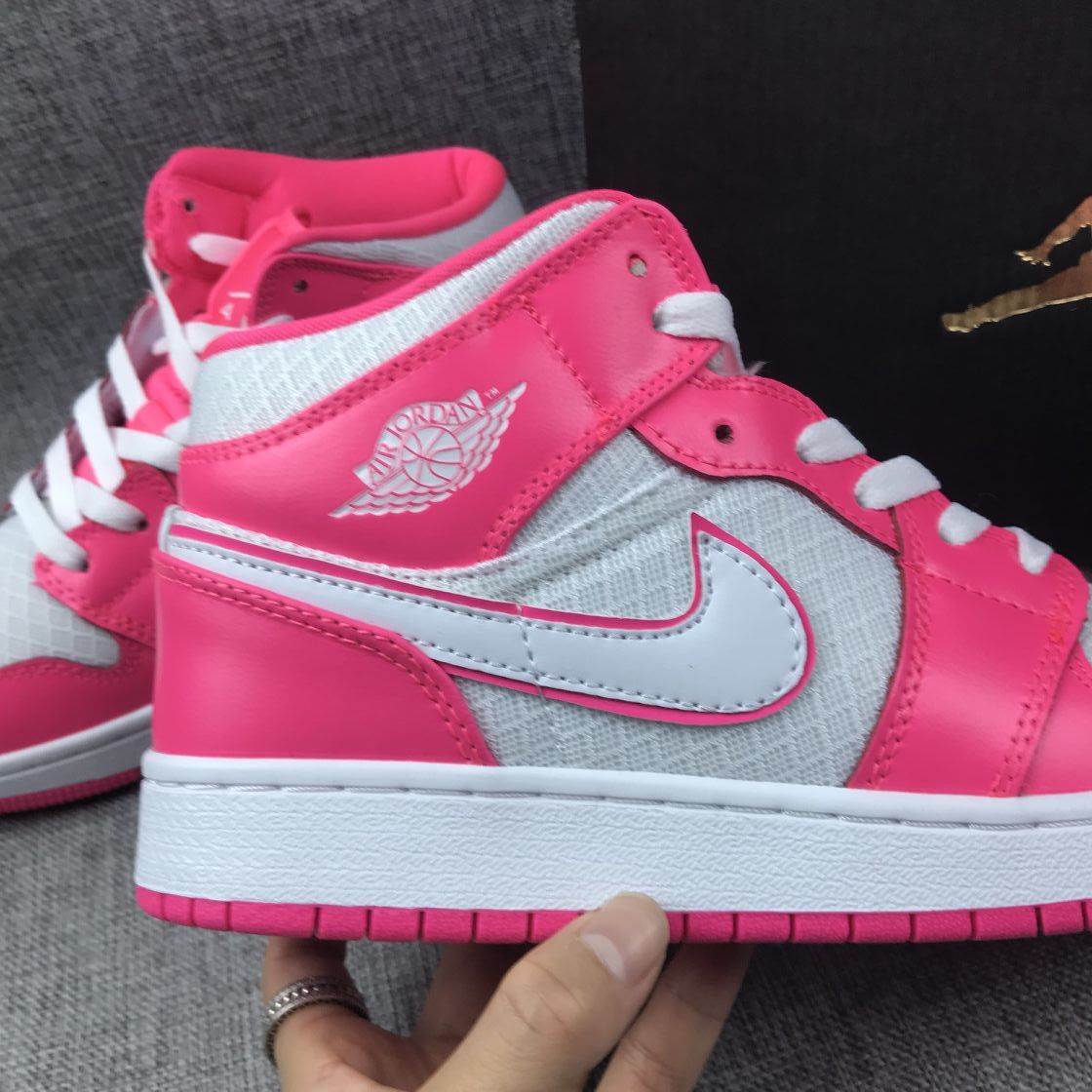 Air Jordan 1 Mid Sneakers in White Pink 555112-611 - product image from the listing.