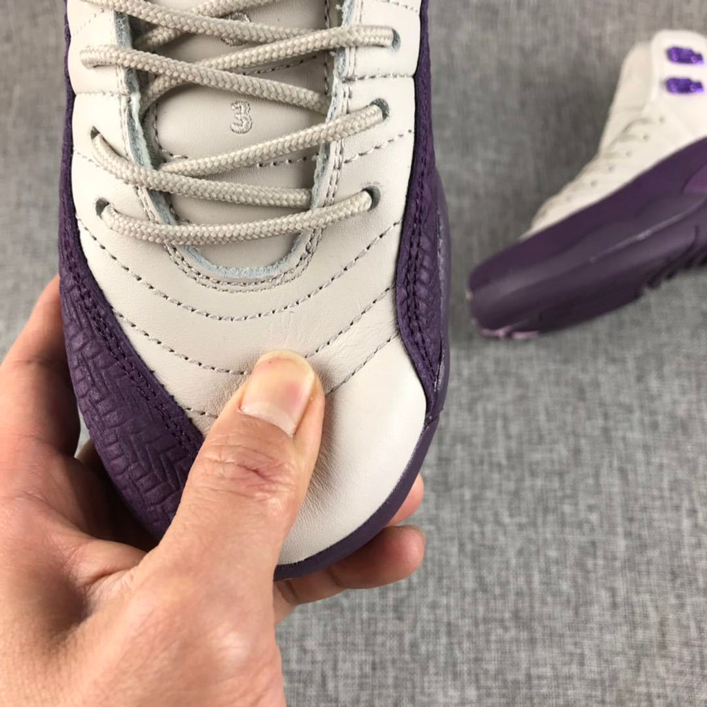Air Jordan 12 White Purple Sneakers 510815-001 - product image from the listing.