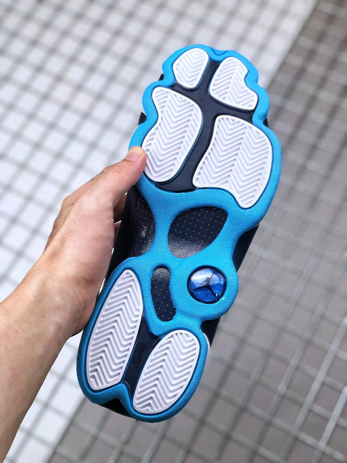 Air Jordan 13 Obsidian Sneakers 414571-144 - product image from the listing.