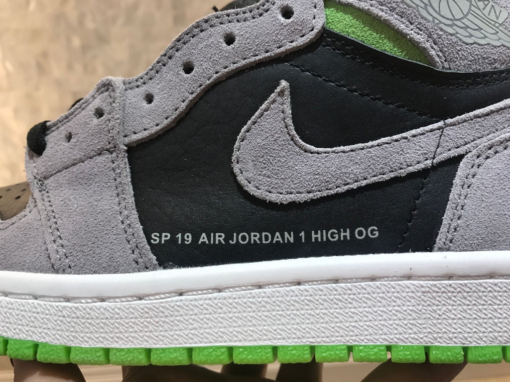 Jordan 1 Retro High OG High-Top Sneakers in Grey Green - product image from the listing.