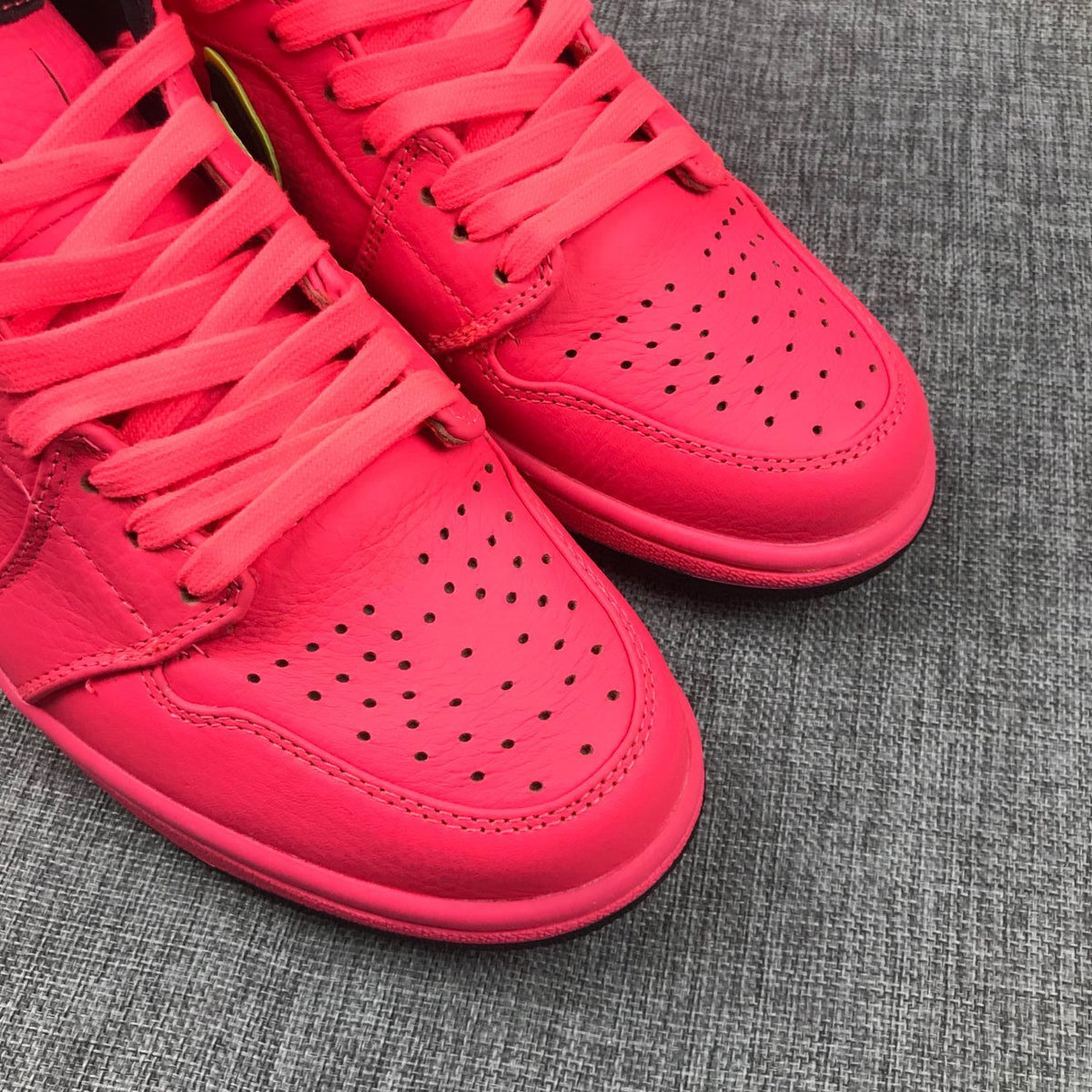 Air Jordan 1 Mid Sneakers in Pink Black Volt AQ9131-600 - product image from the listing.