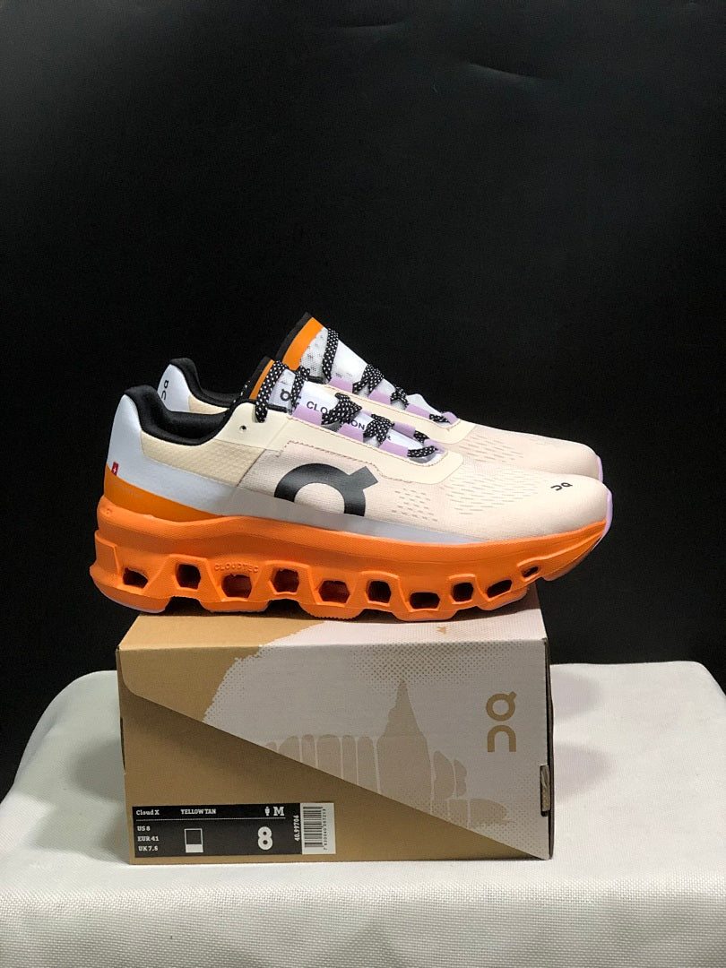 Yellow Tan and Orange On Cloudmonster Running Shoes - product image from the listing.