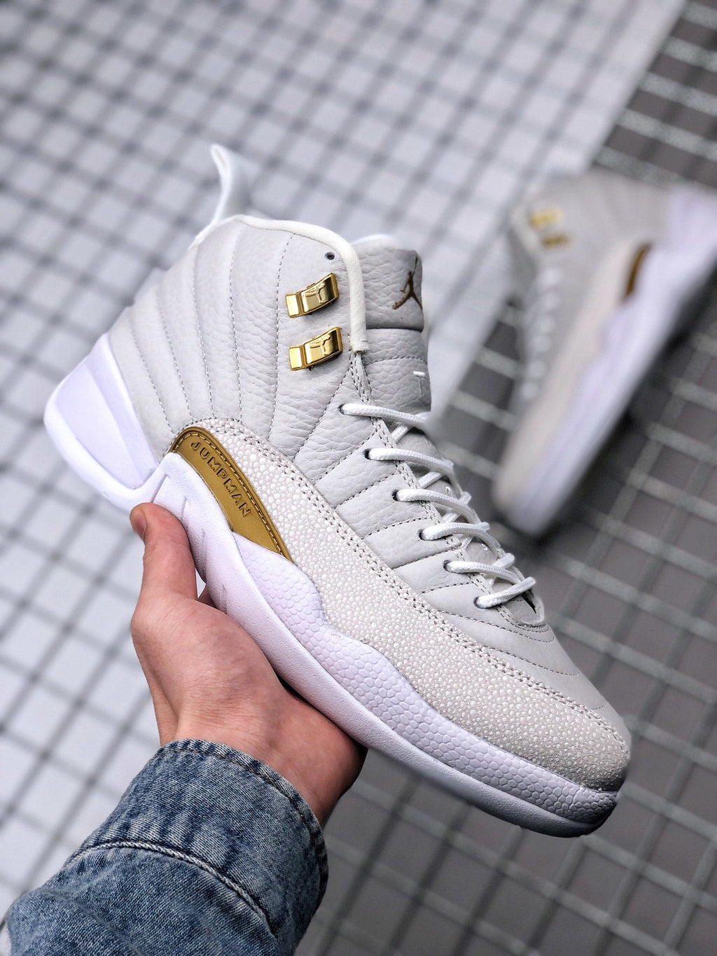 Air Jordan 12 OVO Sneakers in White Gold 873864-102 - product image from the listing.