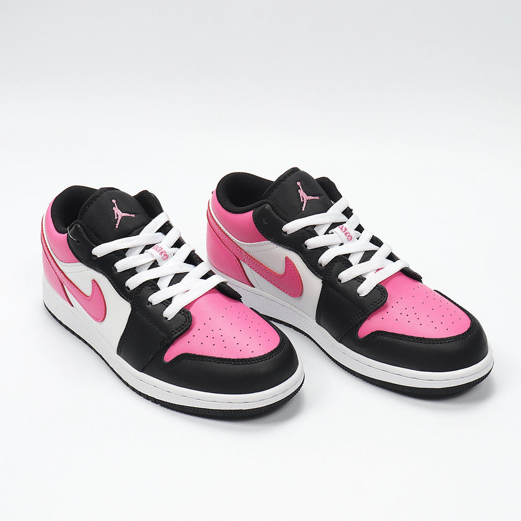 Jordan 1 Low Sneakers in Black Pink White 554723-106 - product image from the listing.