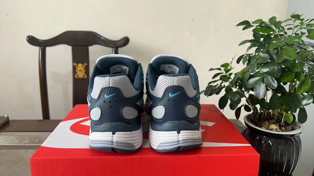 Nike P-6000 Sneakers in White Navy Turquoise CD6404-402 - product image from the listing.