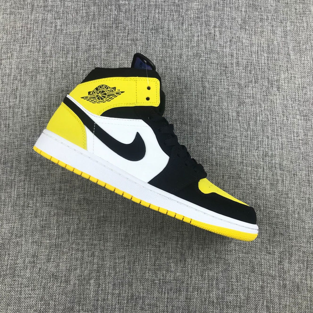 Black Yellow Toe Sneakers - Air Jordan 1 Mid SE 852542-071 - product image from the listing.