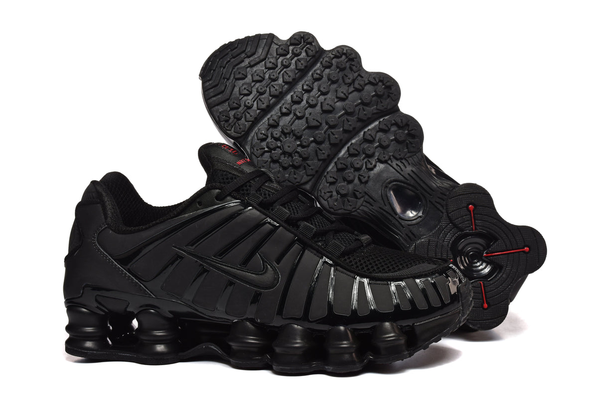 Black and Pink Nike Shox TL Sneakers - product image from the listing.