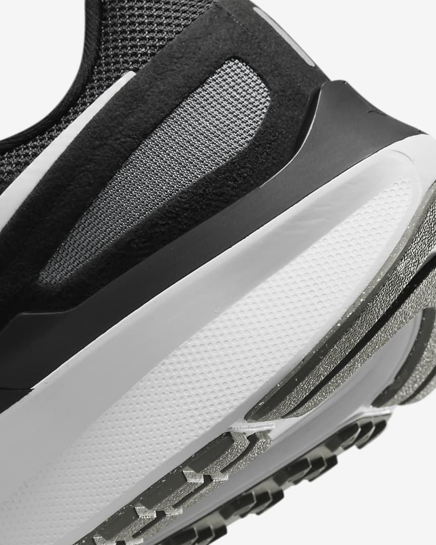 Nike Structure 25 Road Running Shoes in Black DJ7883-002 - product image from the listing.