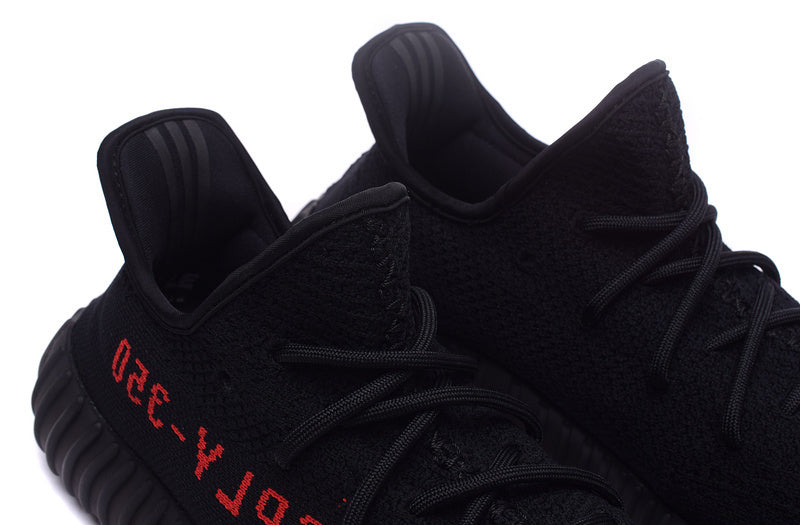 Yeezy 350 V2 Low-Top Sneakers in Black Knit - product image from the listing.