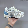 New Balance M1906R Sneakers in White, in Silver and Blue - product image from the listing.
