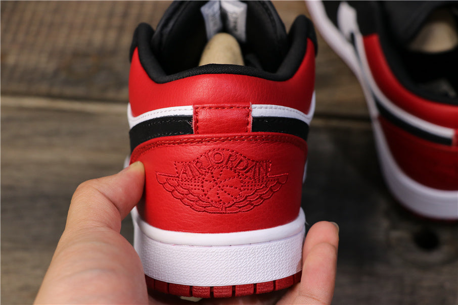 Air Jordan 1 Low Black Toe Red, Sneakers in White and Black - product image from the listing.