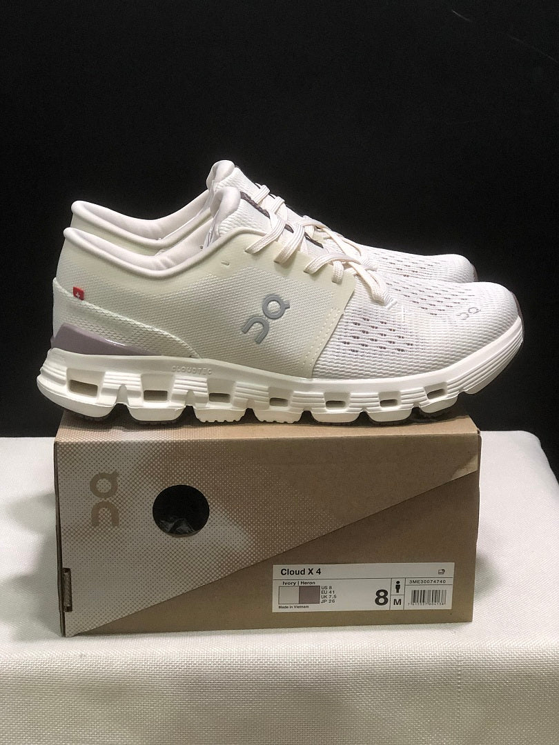 On Cloud X 4 Running Sneakers in Ivory - product image from the listing.