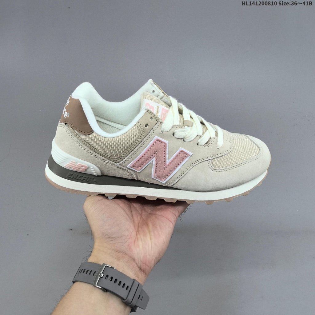 New Balance 574 Retro Sneakers in Black, Grey or in Cream - product image from the listing.