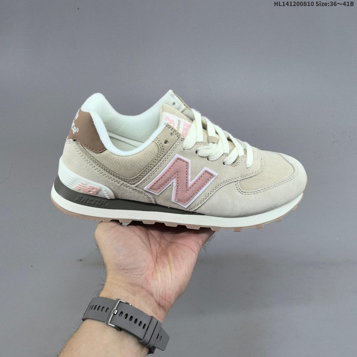 New Balance 574 Retro Sneakers in Black, Grey or in Cream - product image from the listing.