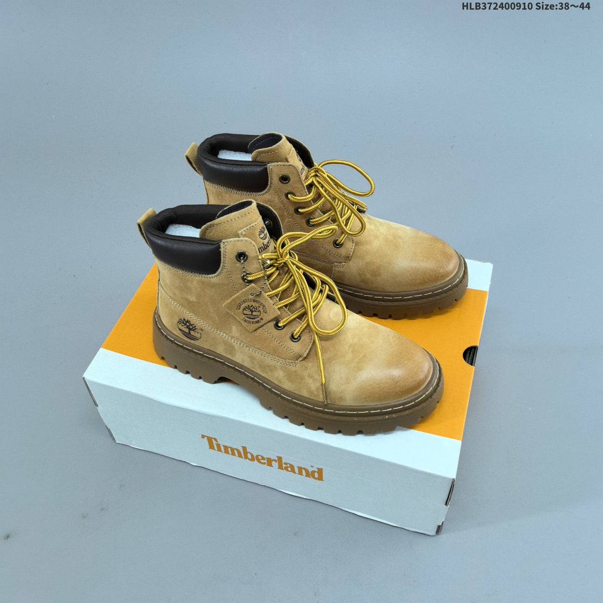 Timberland Mid-Top Lace-Up Boots in Wheat and in Taupe - product image from the listing.