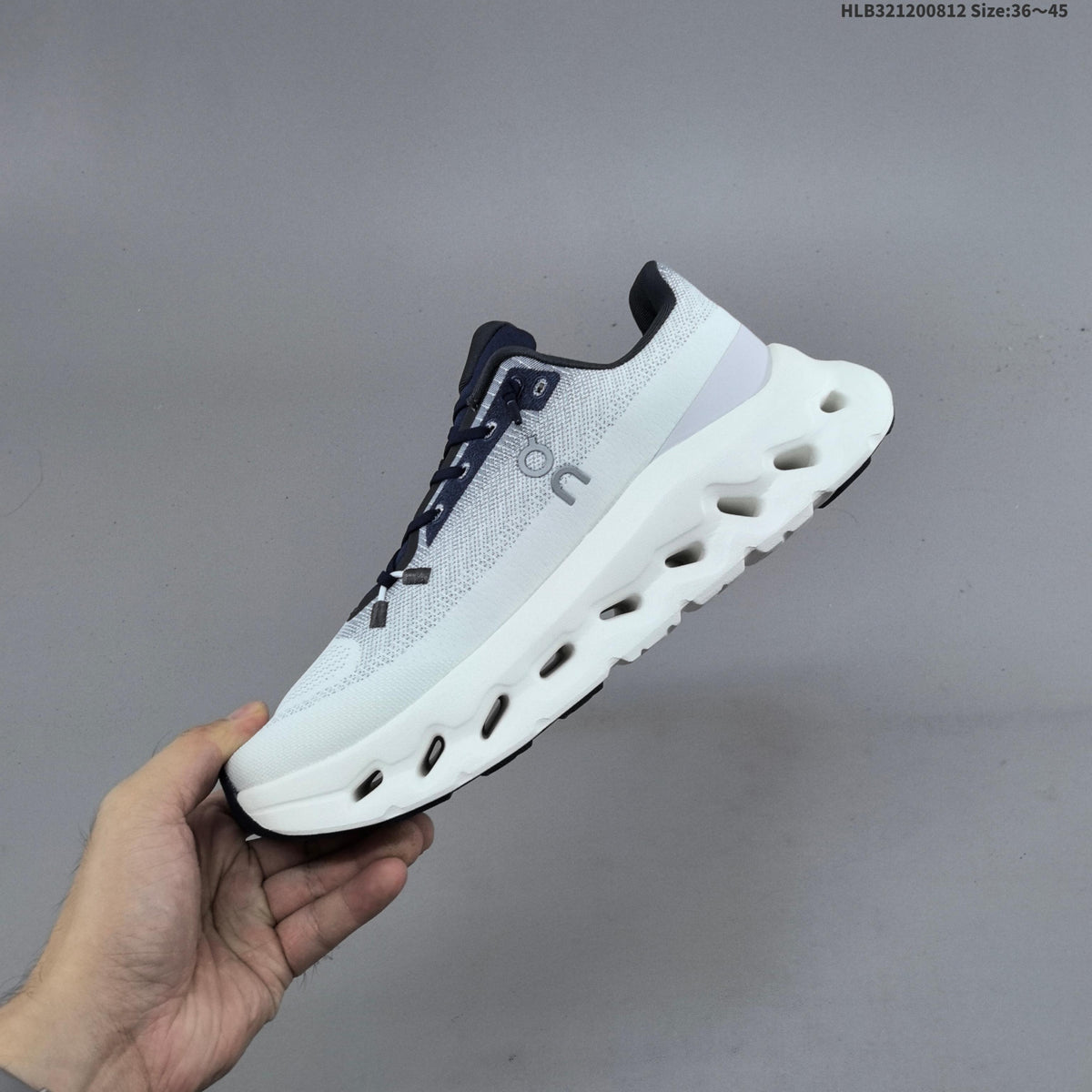 On Cloudtilt Sneakers in White Navy - product image from the listing.
