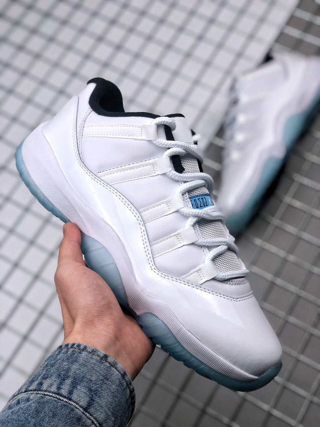 Air Jordan 11 Low Legend Blue Sneakers AV2187-117 - product image from the listing.