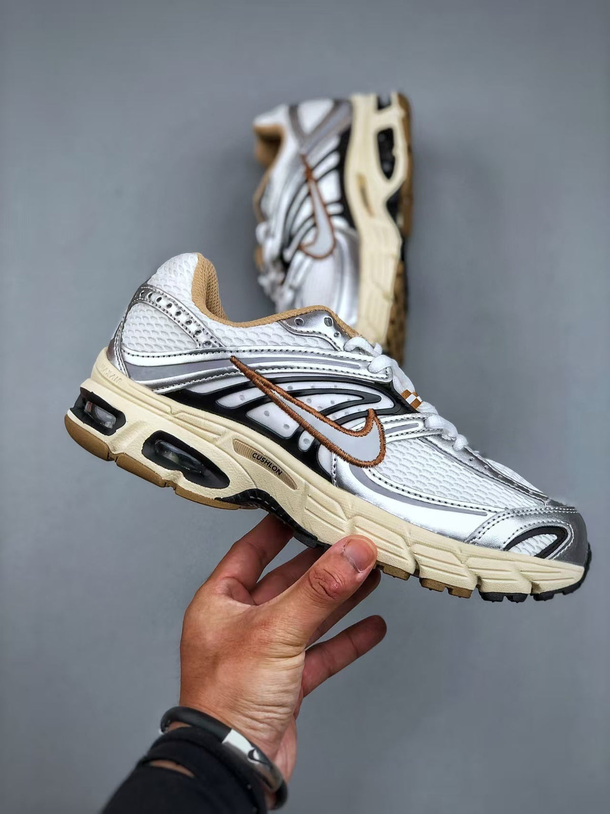 Nike Air Max Moto 2K Low-Top Sneakers in White - product image from the listing.