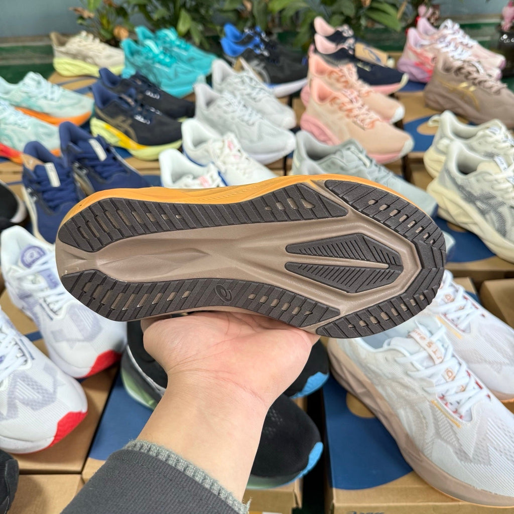 ASICS NOVABLAST 5 LE Running Shoes in Brown - product image from the listing.