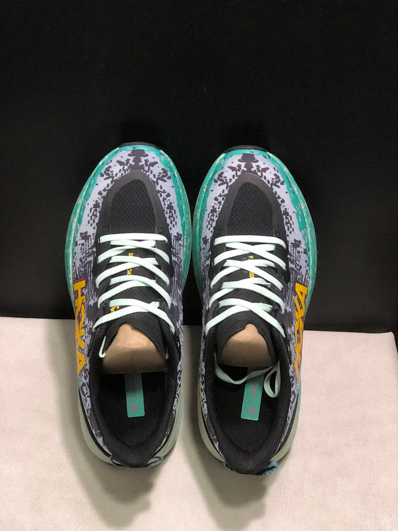 HOKA Speedgoat 6 Trail Running Shoes, in Gray and Teal - product image from the listing.