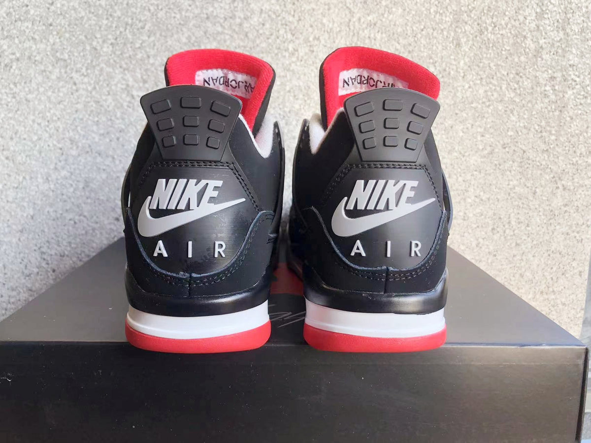 Air Jordan 4 Black Grey Red Sneakers - product image from the listing.