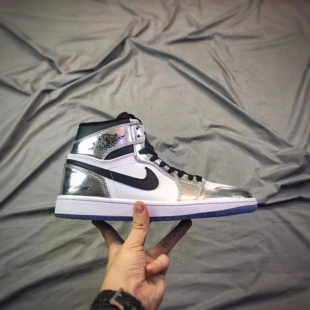 Air Jordan 1 Pass The Torch High-Top Sneakers Silver White - product image from the listing.