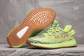 Lime Green and Brown Yeezy Boost 350 V2 Sneakers - product image from the listing.
