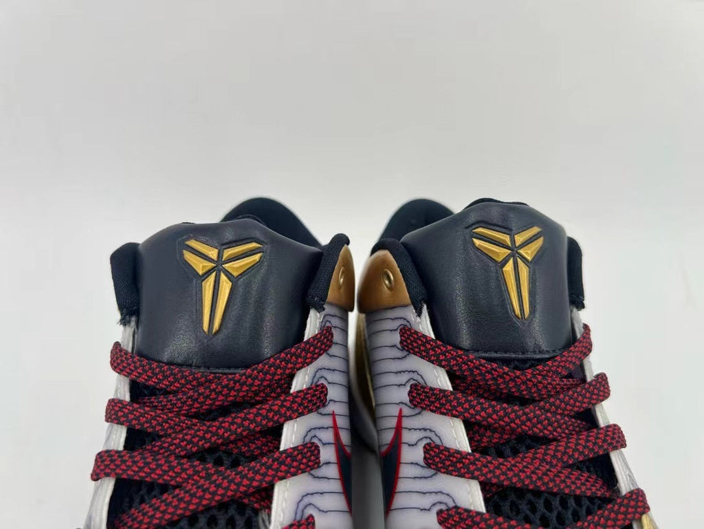 Nike Kobe 4 Protro Sneakers in Gold White 344335-141 - product image from the listing.