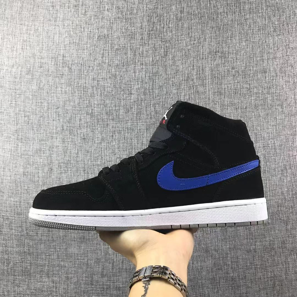 Jordan 1 Mid Sneakers in Black Red Blue 554724-065 - product image from the listing.