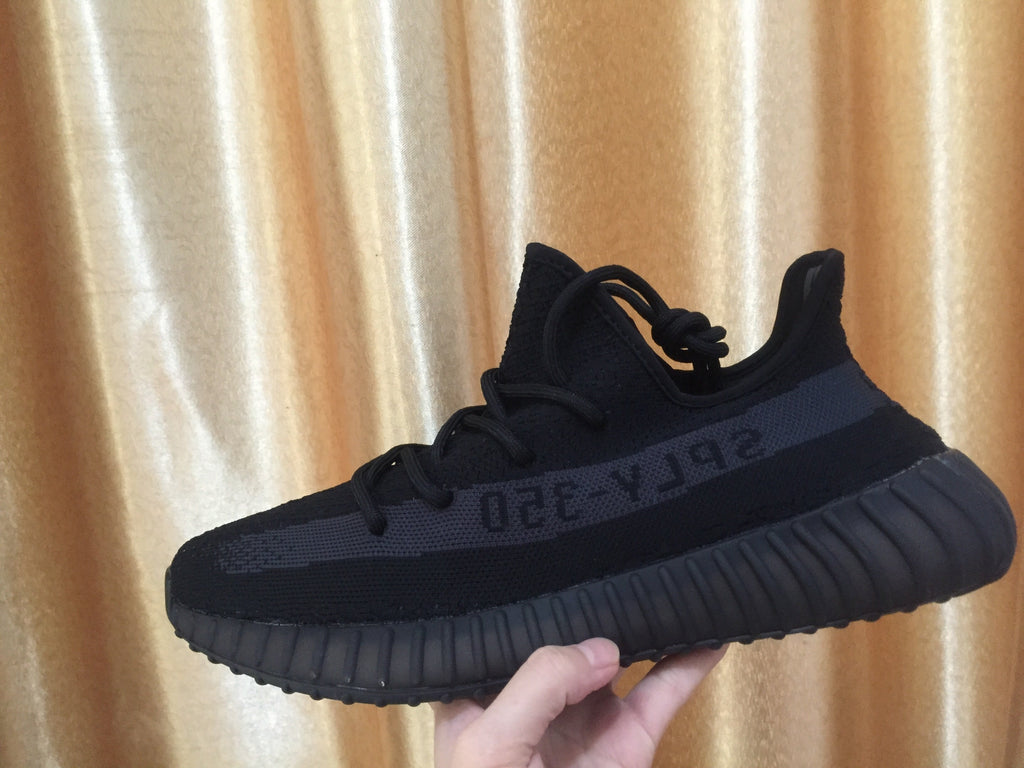 Adidas Yeezy Boost 350 V2 Sneakers in Black Knit - product image from the listing.