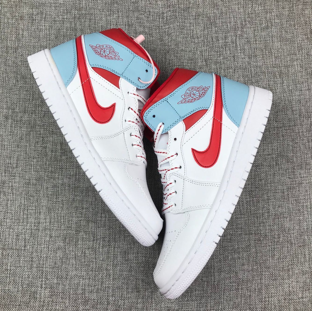 Air Jordan 1 Mid Sneakers in Ice Blue White and Red 555112-104 - product image from the listing.