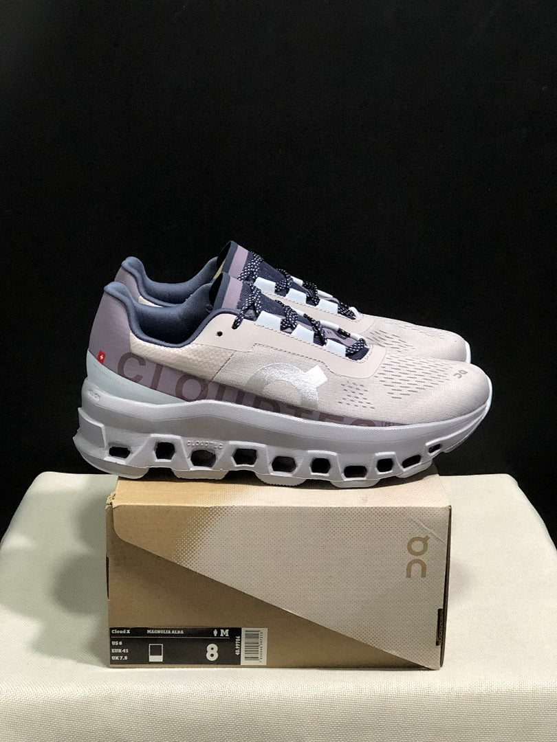 Gray and Purple On Cloudmonster Sneakers - product image from the listing.