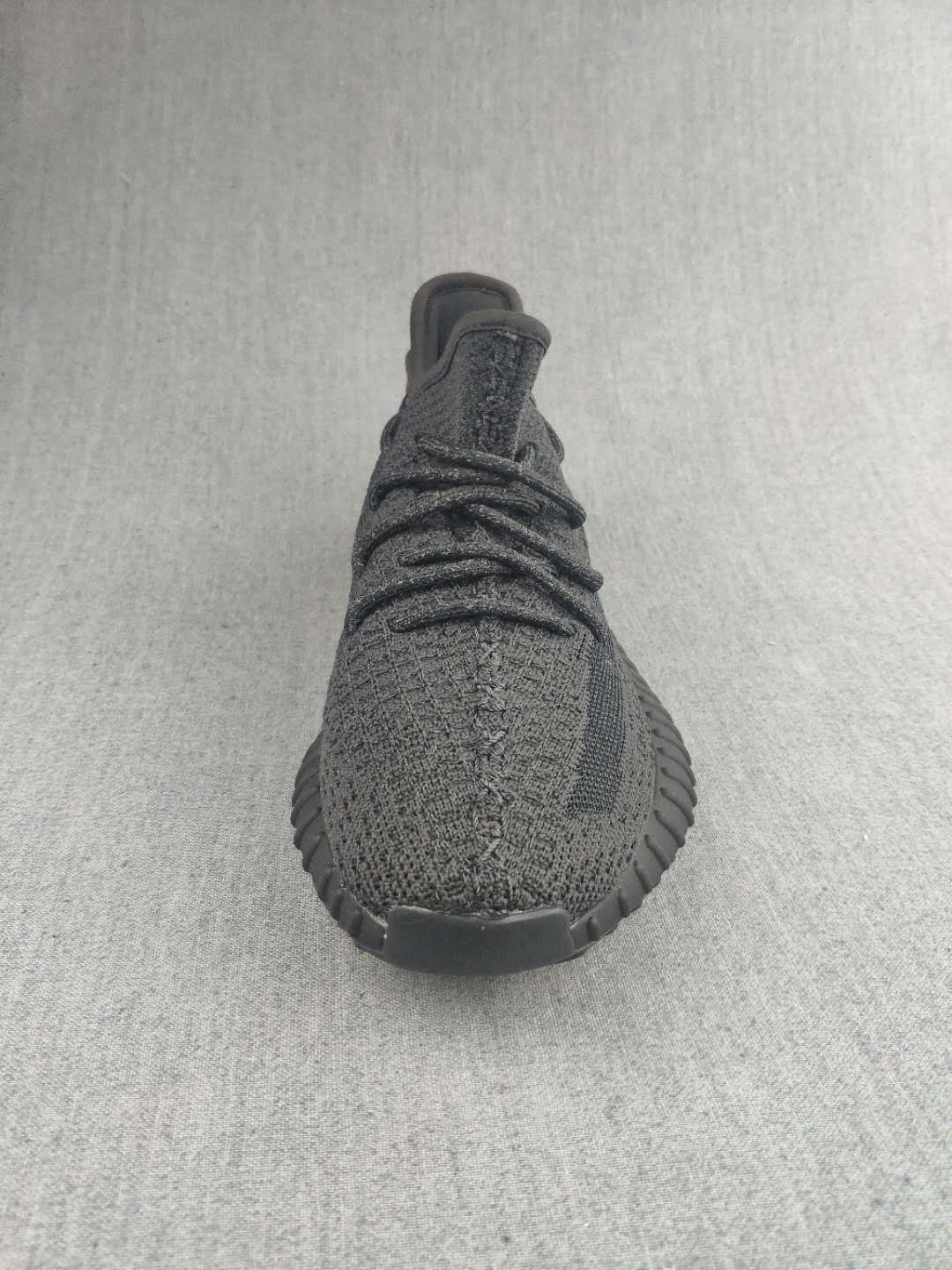 Yeezy Boost 350 V2 Sneakers in Dark Gray Knit - product image from the listing.