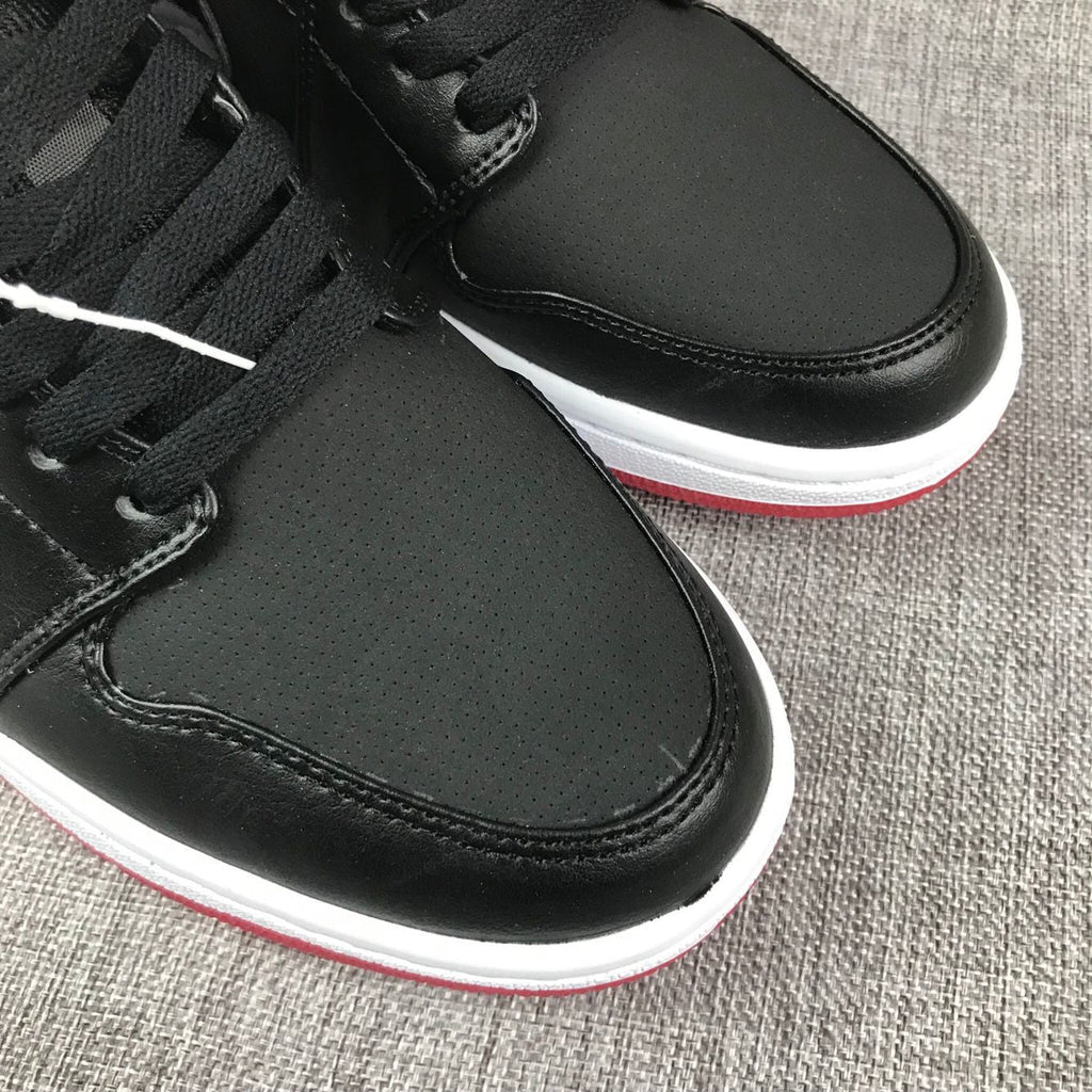 Air Jordan 1 Mid High-Top Sneakers in Black Red White - product image from the listing.