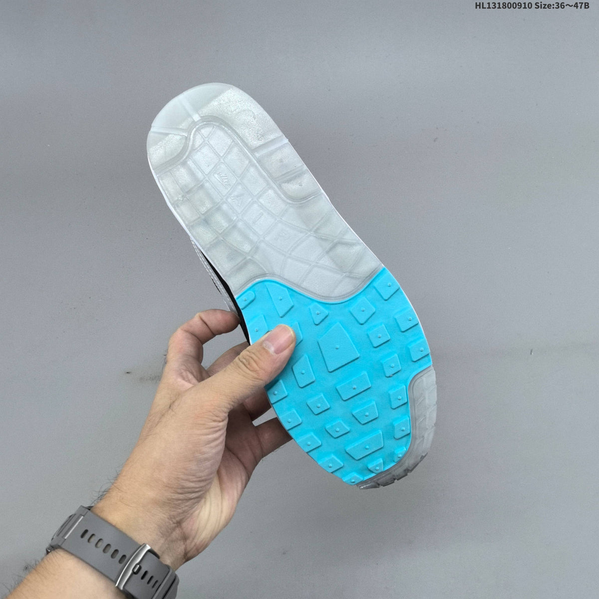 Nike Air Max 1 Sneakers in Black White and Turquoise - product image from the listing.