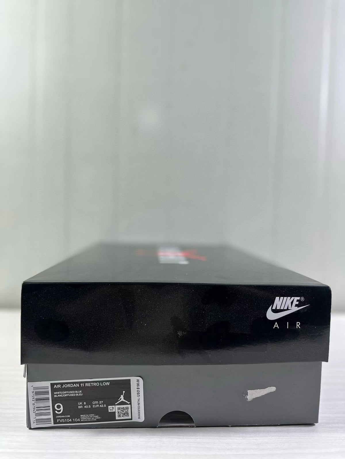 Air Jordan 11 Low Diffused Blue Sneakers FV5104-104 - product image from the listing.