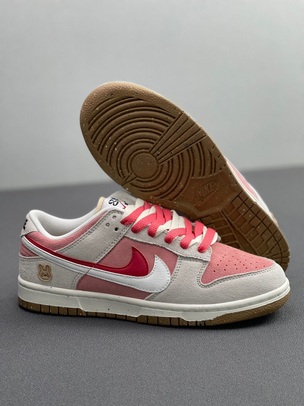 Nike Dunk Low SE Rabbit Year Sneakers in Pink White DO9457-117 - product image from the listing.