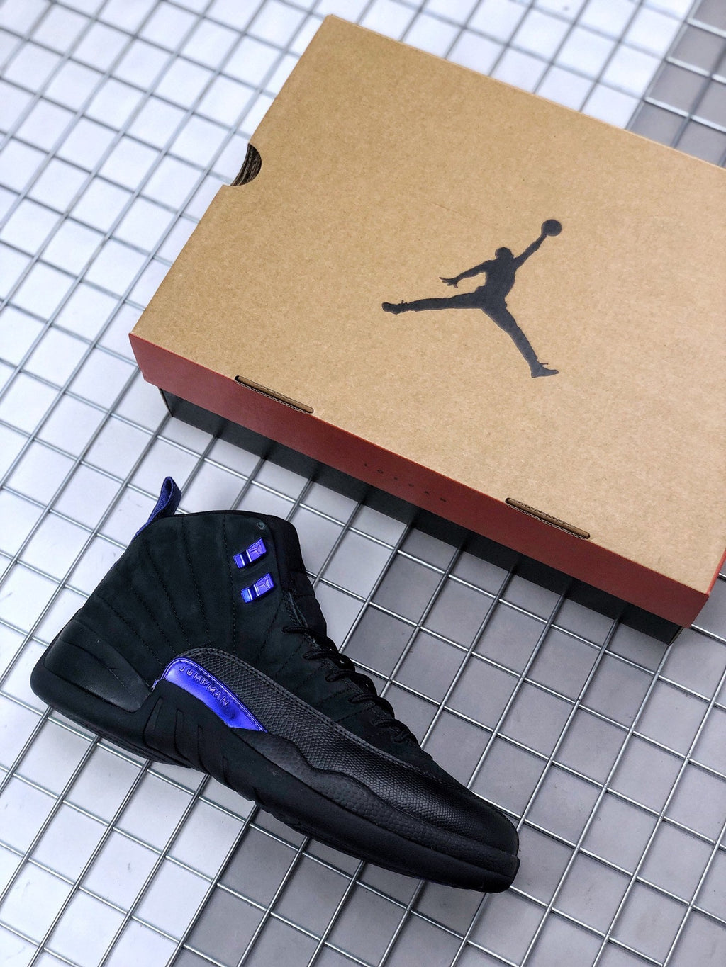 Air Jordan 12 Dark Concord Sneakers CT8013-005 - product image from the listing.