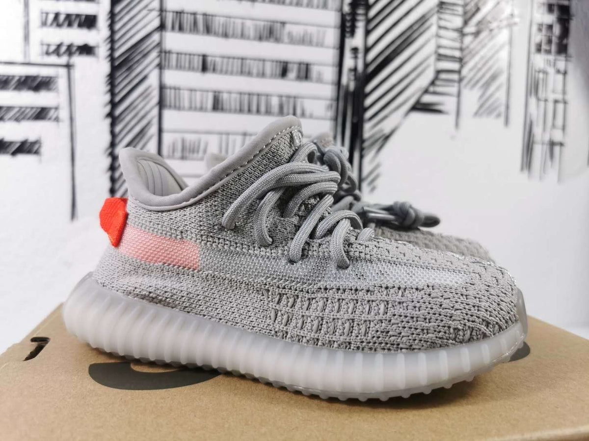 Light Grey and Coral Yeezy 350 V2 Kids Sneakers - product image from the listing.