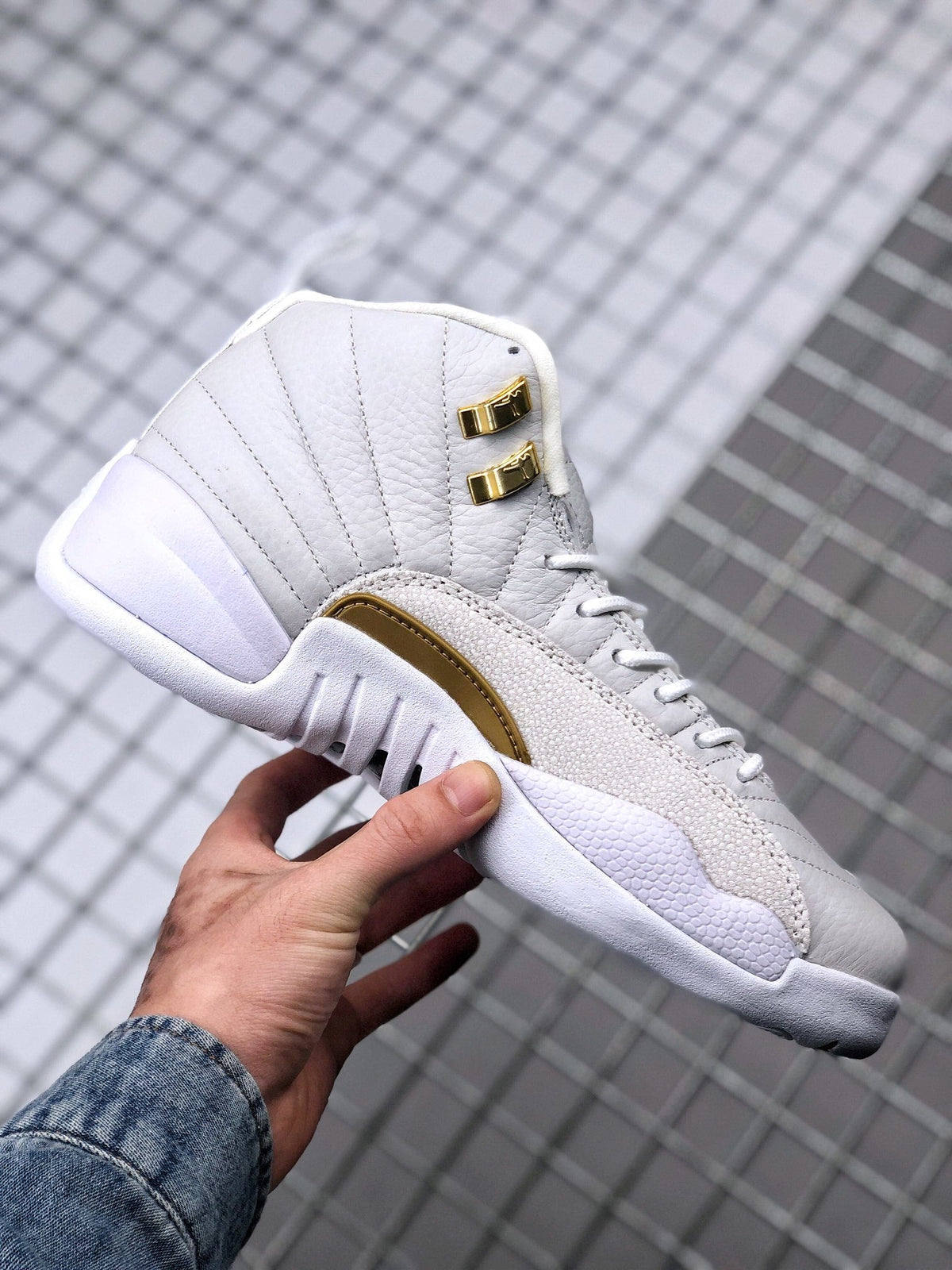 Air Jordan 12 OVO Sneakers in White Gold 873864-102 - product image from the listing.