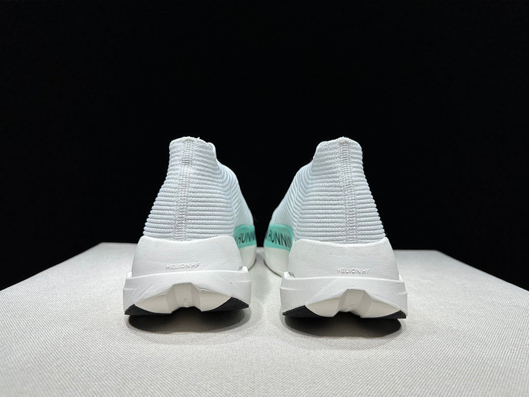 On Cloudboom Strike LS Running Shoes in White Light Green - product image from the listing.