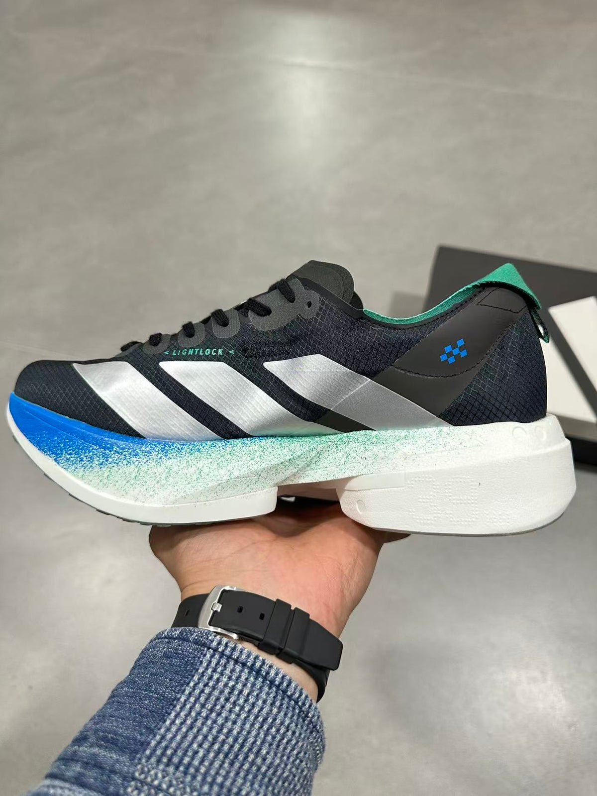 Nike Adizero Lightstrike Pro Running Shoes in Black Blue - product image from the listing.