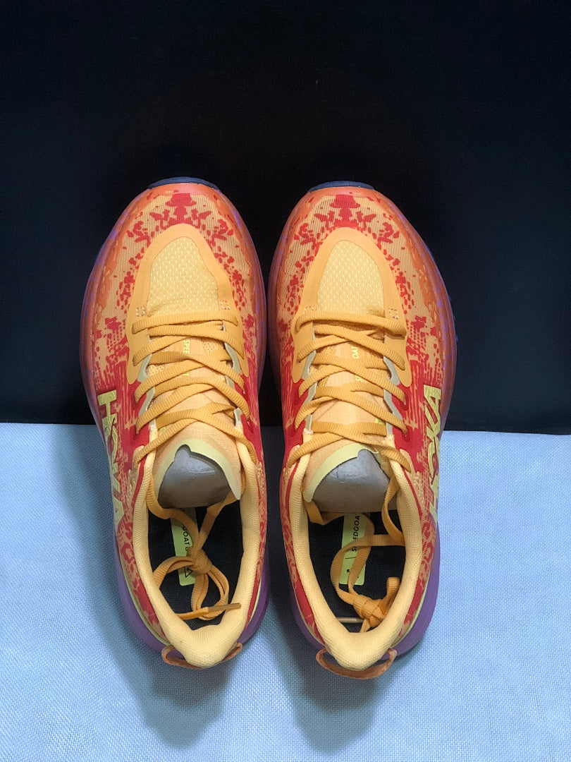 HOKA Speedgoat 6 Trail Running Shoes, in Orange and Yellow - product image from the listing.