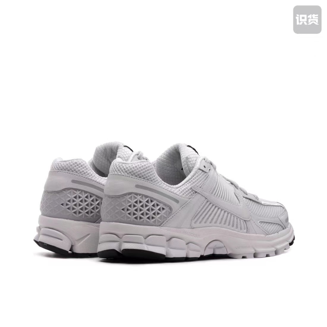 Nike Zoom Vomero 5 Sneakers in Grey and White - product image from the listing.