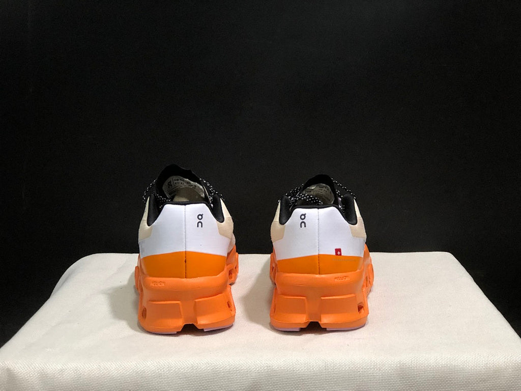 Yellow Tan and Orange On Cloudmonster Running Shoes - product image from the listing.