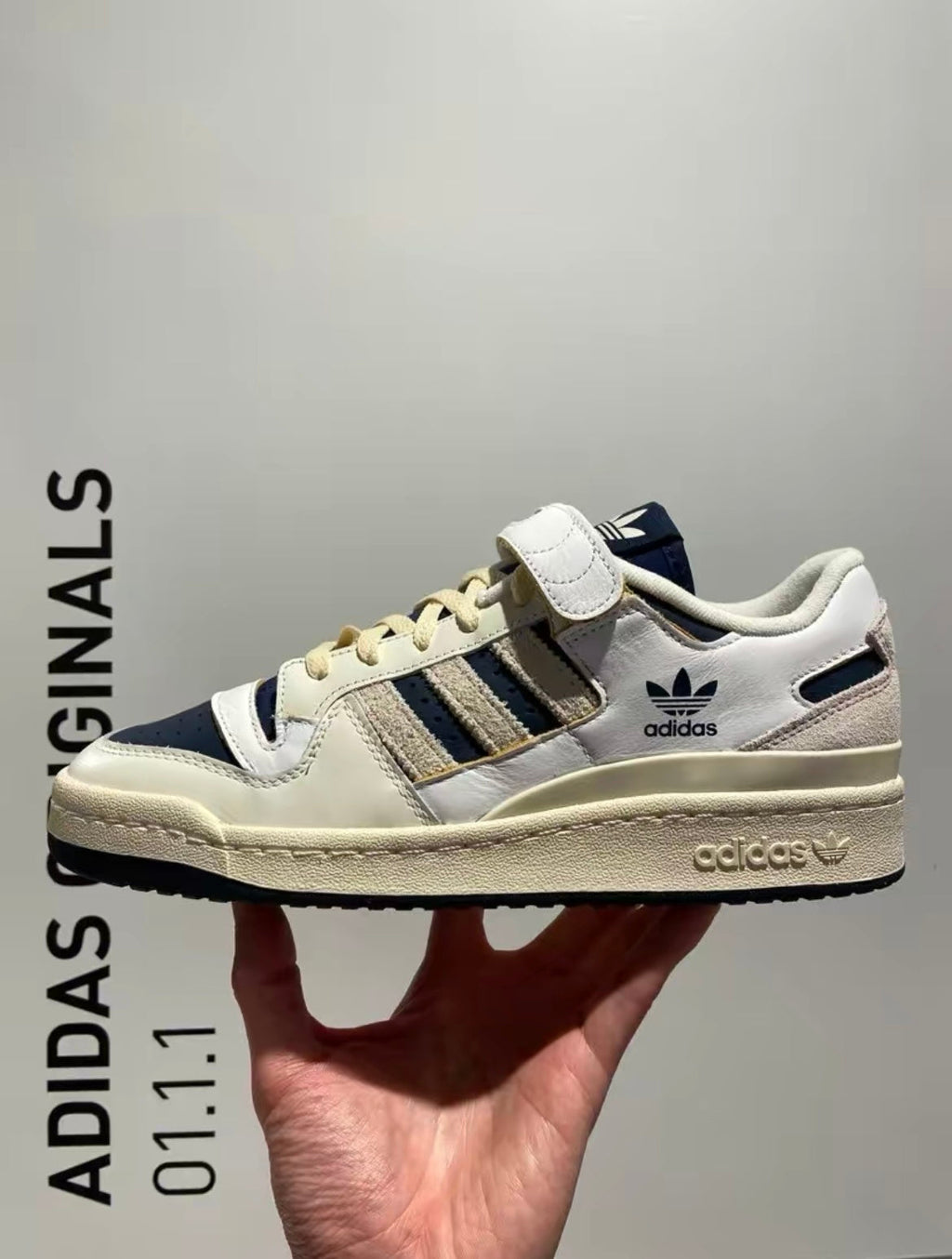 adidas Originals Forum 84 Low Sneakers in White Navy GZ6427 - product image from the listing.