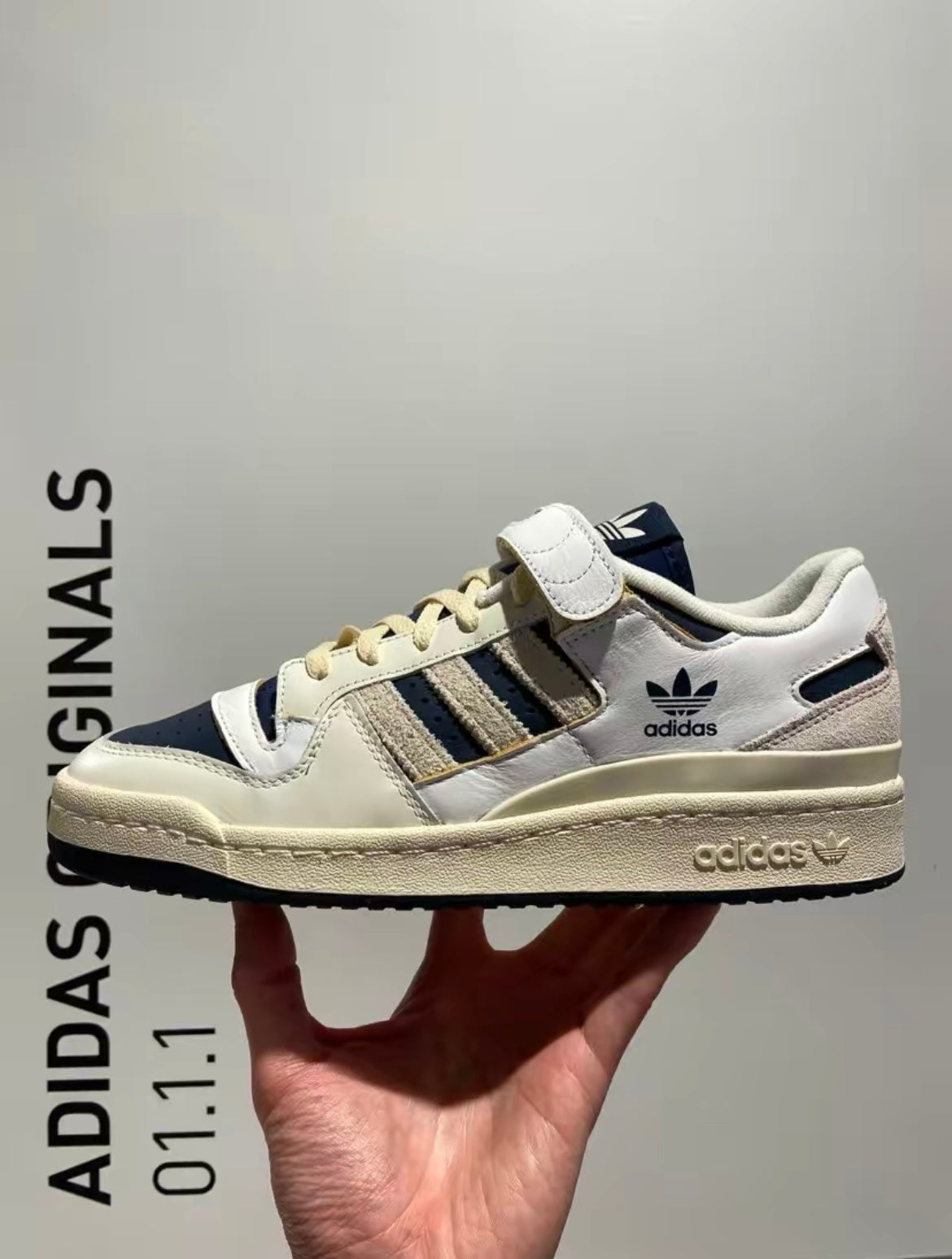 adidas Originals Forum 84 Low Sneakers in White Navy GZ6427 - product image from the listing.