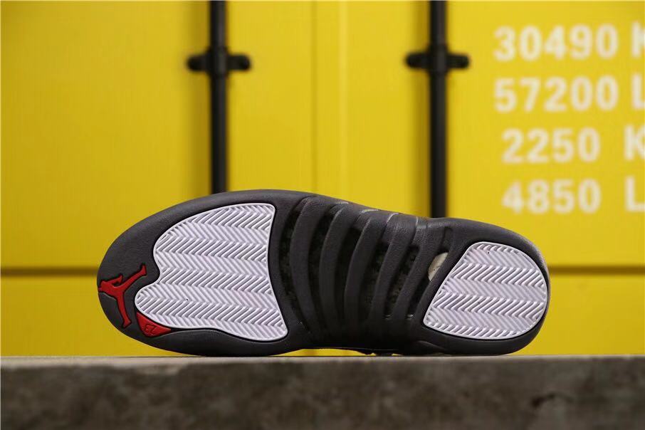 Air Jordan 12 Retro Dark Grey Sneakers in White Black - product image from the listing.